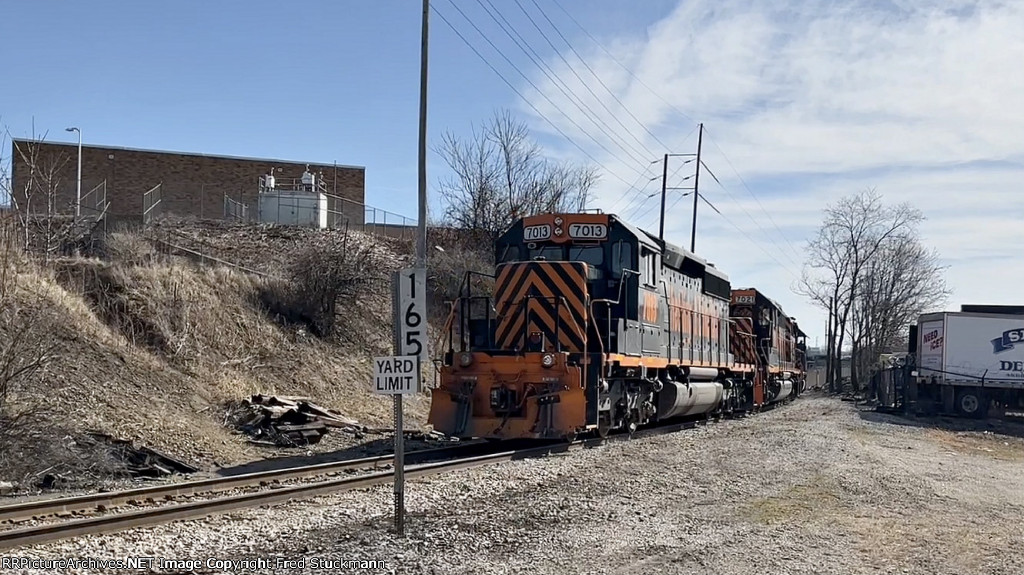WE 7013 brings up the rear on this move back to the yard.